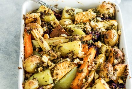 View Walnut pesto roasted potatoes & parsnips Large oven baking dish full with roasted potatoes and parsnips, mixed with walnut pesto