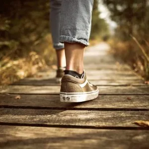A photo of someone walking in nature