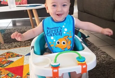 View Weaning Week! Weaning your allergic baby Baby in a chair on the floor
