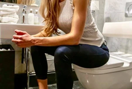 View The cost of constipation Megan Rossi sat on toilet seat