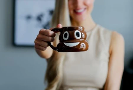 View Time to #GutTalk & break the taboos around gut health! dr megan rossi holding poop mug