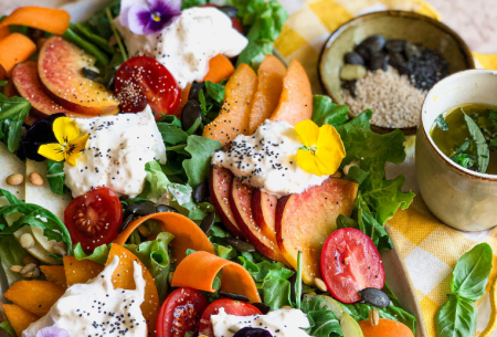 View End of summer salad (Super Six) Photo of a vibrant end of summer salad including tomatoes, burrata, peaches, pears, seeds, rocket and other super six plant group ingredients