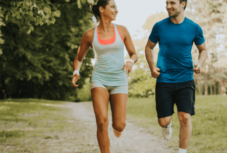View Is Your Exercise Routine Impacting Your Gut Function? Picture of two people exercising and staying active