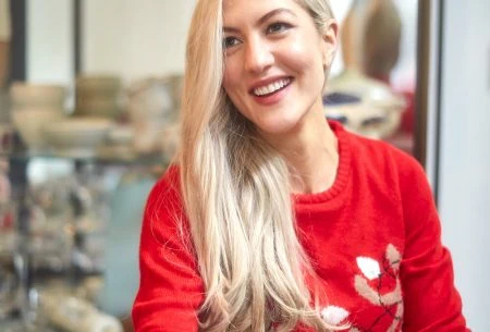 View How to keep your gut happy this festive season Megan Rossi in a Christmas jumper pulling a cracker