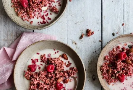 View Why I’d never recommend cutting out grains! 3 bowls of raspberry granola, milk and fresh raspberries