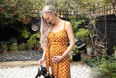 View Pregnancy nutrition tips Megan Rossi and her dog in the garden
