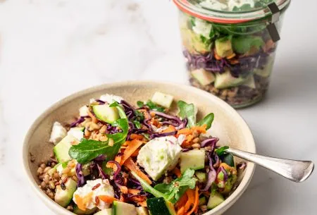 View Zingy salad jar A bowl of the zingy salad with a jar in the background